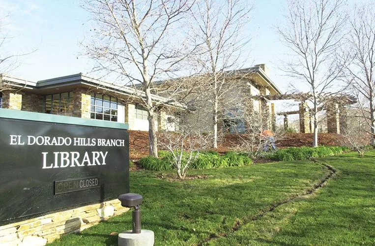 2006 sign before the library opened